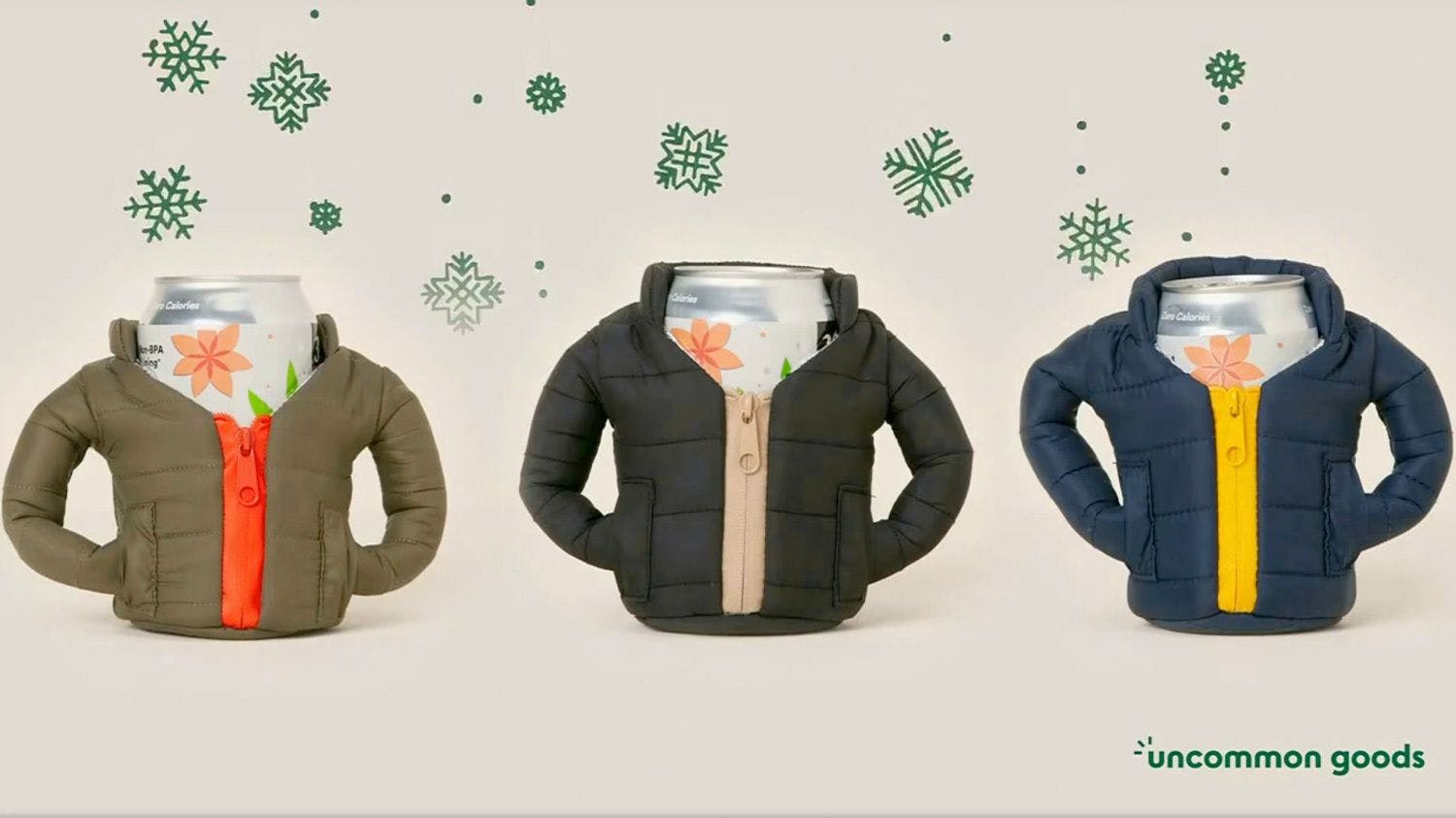 an image featuring three cans of drinks in mini jackets from an Uncommon Goods ad