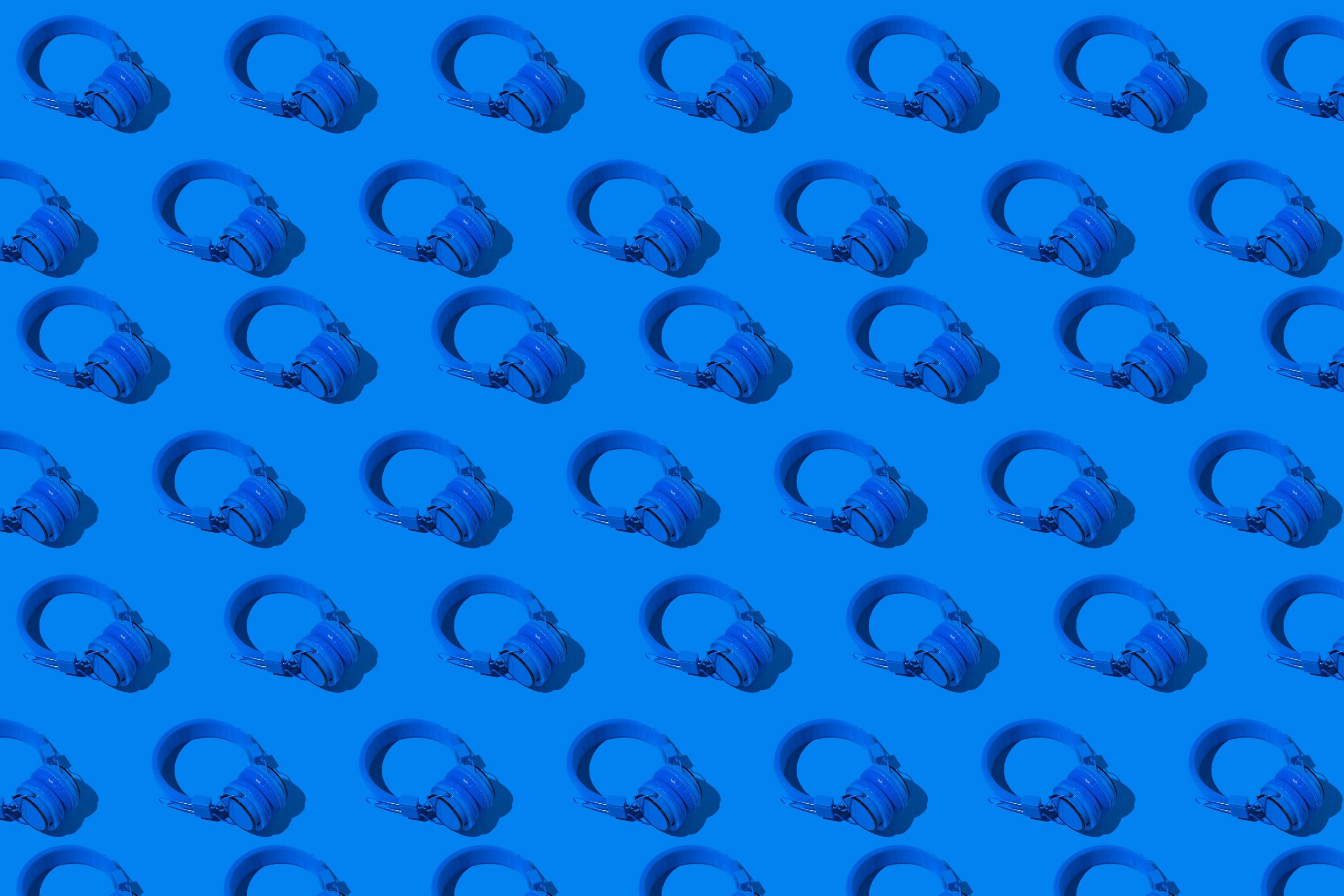 blue headphones on a blue background