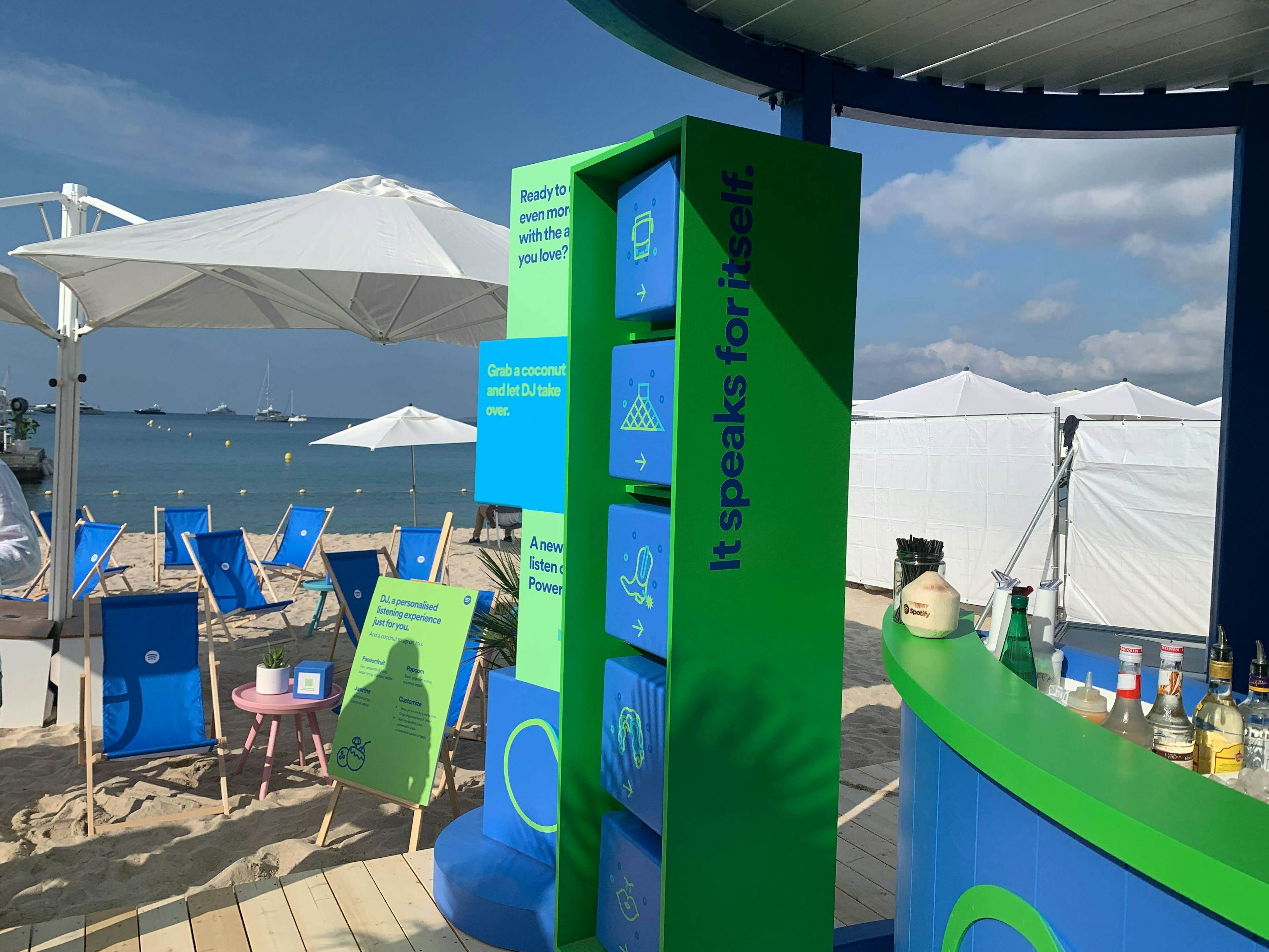 A display at Spotify's Cannes activation promoting its AI-enabled DJ reading "It speaks for itself."