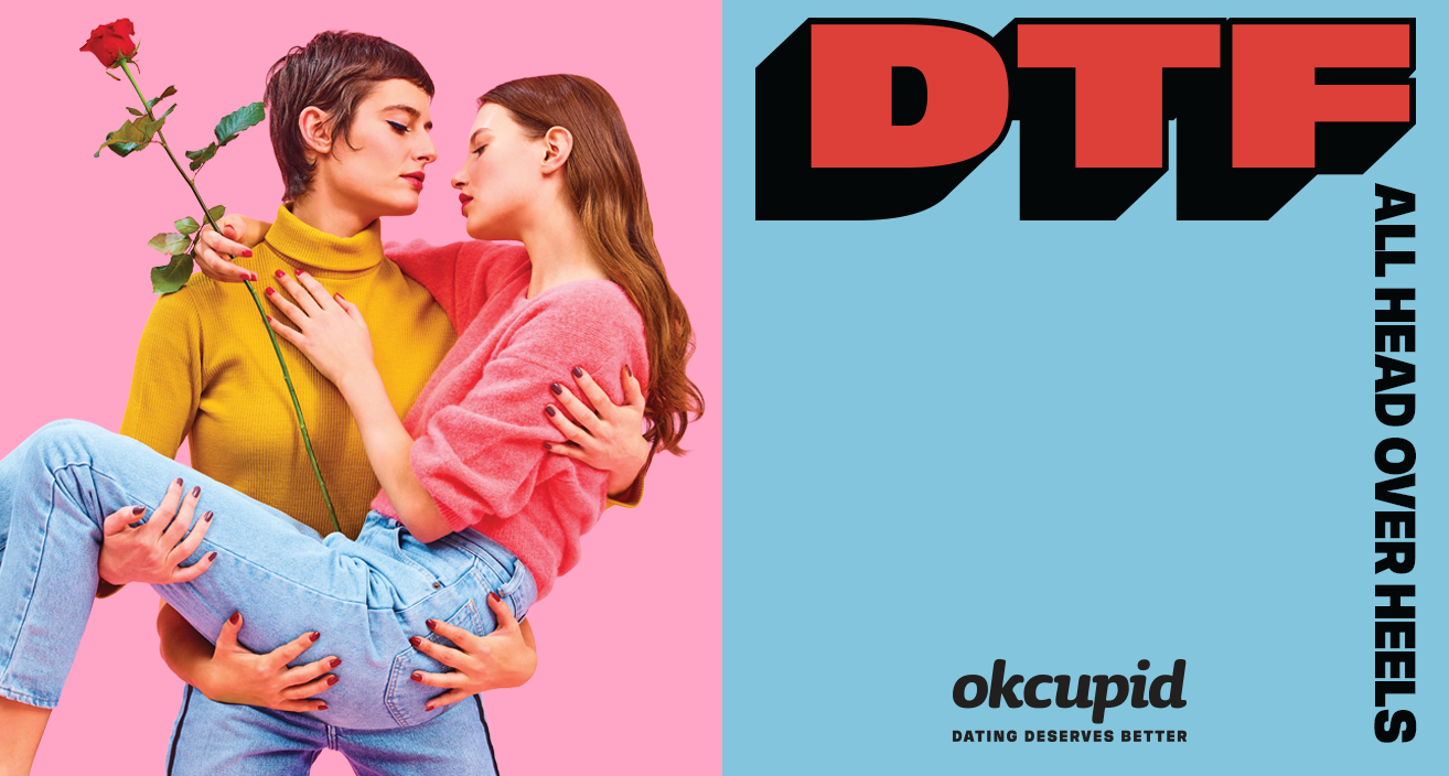 OkCupid "Down to fall head over heels" ad featuring two women