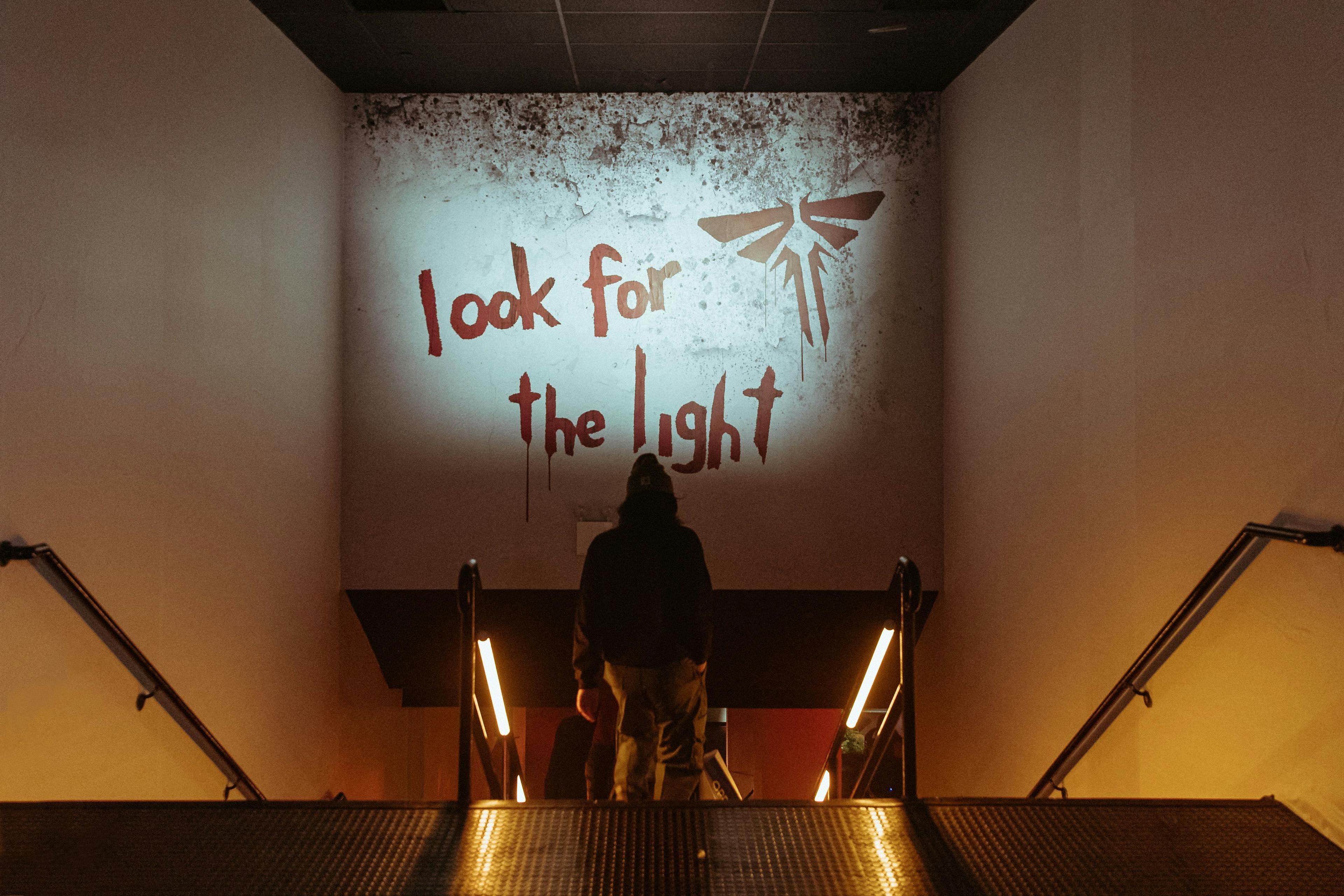a sign that says "Look for the Light" that was part of "The Last of Us" promo